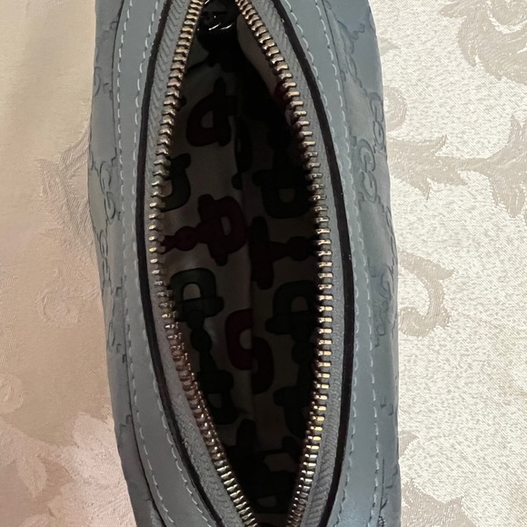Gucci - authentic cosmetic pouch. Pairs beautifully with my Blue Coach handbag. - Picture 8 of 12